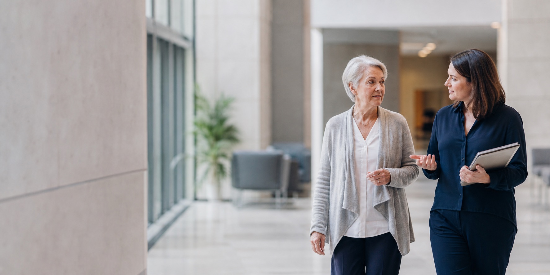 A participant walking with a clinical research coordinator